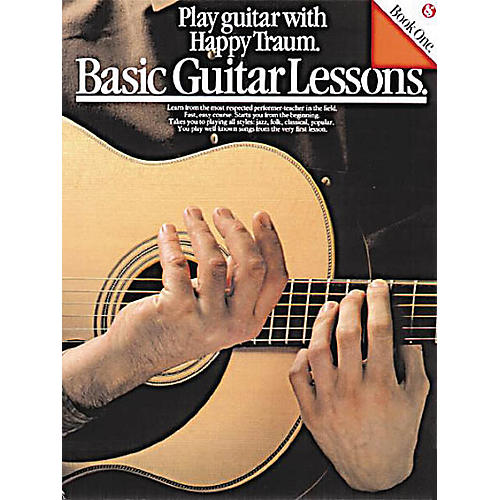 Basic Guitar Lessons (Play Guitar with Happy Traum) Music Sales America Series Softcover by Happy Traum