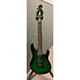 Used Sterling by Music Man John Petrucci JP157 7 String Solid Body Electric Guitar Trans Green