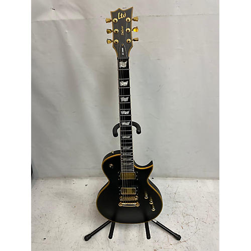 ESP LTD EC1000 Deluxe Solid Body Electric Guitar Black and Gold