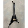 Used Jackson Pro Series Signature Mark Heylmun Rhoads RR24-7 Solid Body Electric Guitar Black and Gold