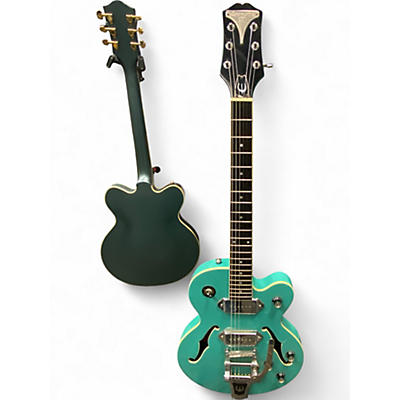 Used 2002 Epiphone Wildkat Turquoise Hollow Body Electric Guitar