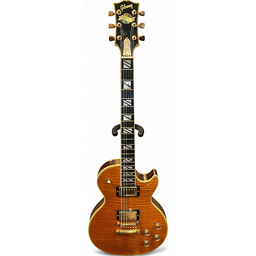 Used 2007 Gibson Les Paul Supreme Trans Amber Solid Body Electric Guitar Trans Amber