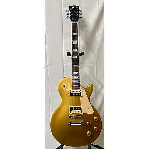 Gibson Used 2009 Gibson Les Paul Gold Solid Body Electric Guitar Gold