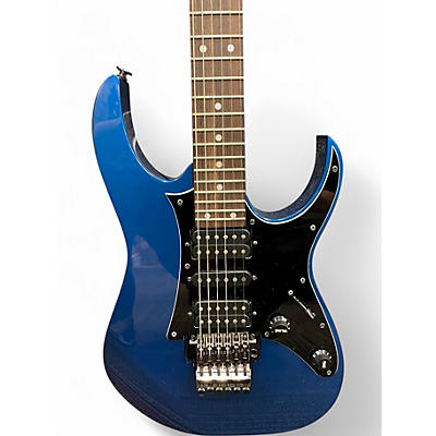 Used 2010s Ibanez RG655 Prestige Cobalt Blue Metallic Solid Body Electric Guitar
