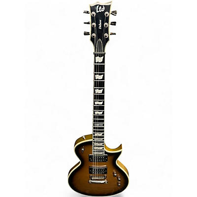 Used 2012 ESP LTD EC1000 Gold Sunburst Solid Body Electric Guitar
