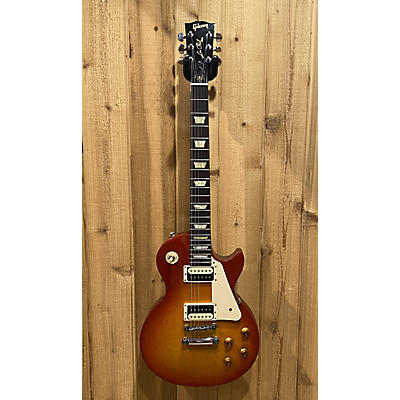 Gibson Used 2012 Gibson Les Paul Studio Cherry Sunburst Solid Body Electric Guitar