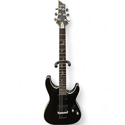 Used 2019 Schecter Guitar Research Damien Platinum Black and Gold Solid Body Electric Guitar