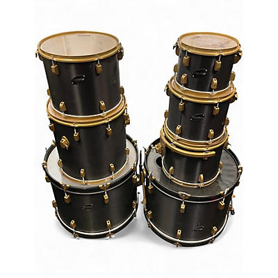 Used 2020s Ludwig 7 Piece 7 piece rocker drum set black carbon fiber wrap finish with gold hardware Drum Kit