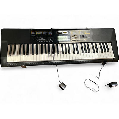 Used Casio CTK2400 61-Key Portable Keyboard