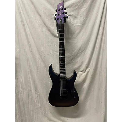 ESP Used ESP LTD H1001 Deluxe Violet Andromeda Solid Body Electric Guitar