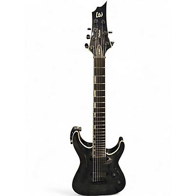 Used ESP LTD H1007 7 String See Thru Black Solid Body Electric Guitar