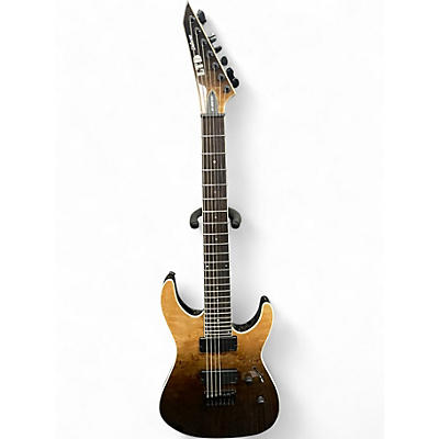 Used ESP LTD M1007HT black to natural fade Solid Body Electric Guitar