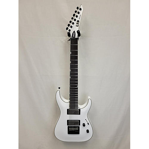 ESP Used ESP LTD MH1000 Deluxe Alpine White Solid Body Electric Guitar Alpine White