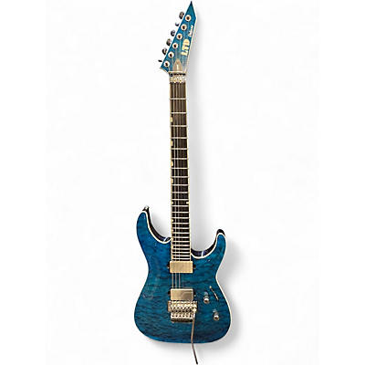 Used ESP LTD MH1000 Deluxe Trans Blue Solid Body Electric Guitar