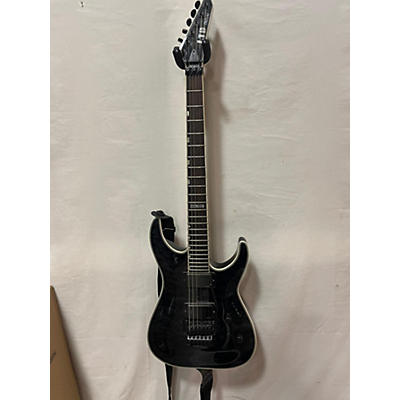 ESP Used ESP LTD MH1001 Deluxe Trans Black Solid Body Electric Guitar