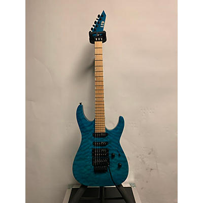 ESP Used ESP LTD MH203 Trans Blue Solid Body Electric Guitar