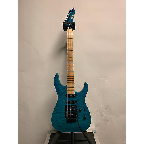 ESP Used ESP LTD MH203 Trans Blue Solid Body Electric Guitar Trans Blue