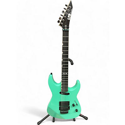 ESP Used ESP LTD Mirage Deluxe '87 Turquoise Solid Body Electric Guitar