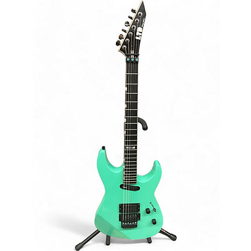 ESP Used ESP LTD Mirage Deluxe '87 Turquoise Solid Body Electric Guitar Turquoise