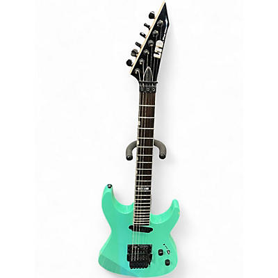 Used ESP LTD Mirage Deluxe '87 Turquoise Solid Body Electric Guitar