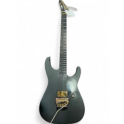Used ESP ltd deluxe m1001 Black Solid Body Electric Guitar