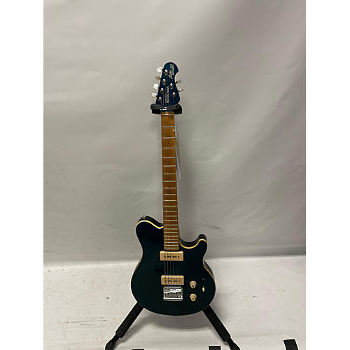 Ernie Ball Music Man Used Ernie Ball Music Man Axis Super Sport Trans Blue Solid Body Electric Guitar Trans Blue