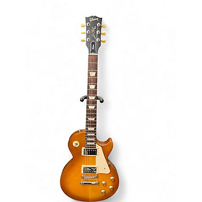 Used Gibson 1960s Tribute Les Paul Honey Burst Solid Body Electric Guitar