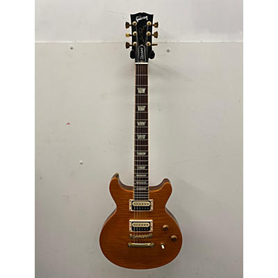 Gibson Used Gibson Les Paul Standard Double Cut Trans Amber Solid Body Electric Guitar