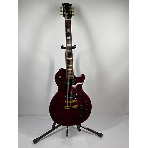 Gibson Used Gibson Les Paul Studio Premium Plus Trans Red Solid Body Electric Guitar Trans Red