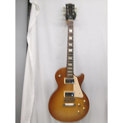 Gibson Used Gibson Les Paul Tribute Honey Burst Solid Body Electric Guitar