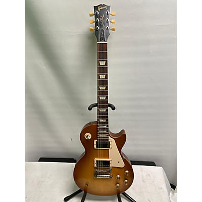 Gibson Used Gibson Les Paul Tribute Honey Burst Solid Body Electric Guitar