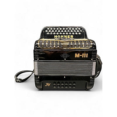 Used Hohner M-III FBbEb Accordion