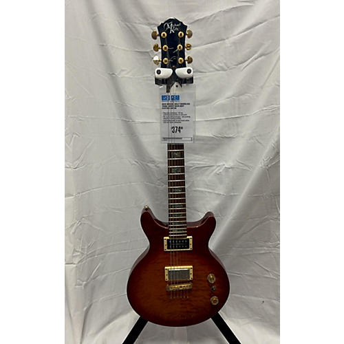 Michael Kelly Used Michael Kelly Hourglass Trans Amber Solid Body Electric Guitar Trans Amber