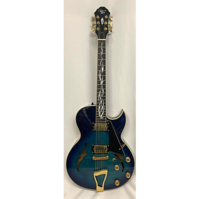 Michael Kelly Used Michael Kelly Vibe Blue Burst Hollow Body Electric Guitar