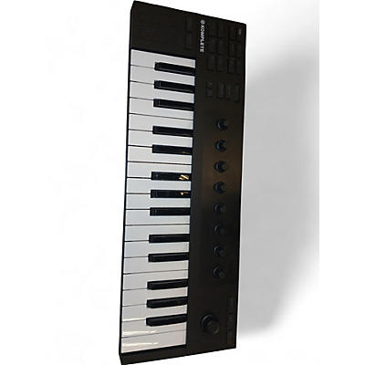 Used Native Instruments Komplete Kontrol  M32 MIDI Controller