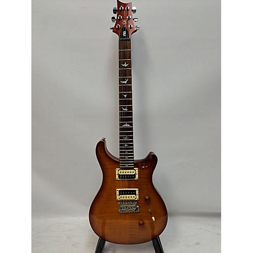 PRS Used PRS SE Custom 24 Amber Solid Body Electric Guitar Amber