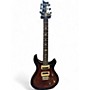 Used PRS Used PRS SE Custom 24 Black and Gold Solid Body Electric Guitar Black and Gold