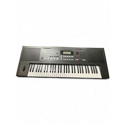 Used Roland E-X50 Arranger Keyboard