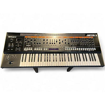 Used Roland jupiter x Synthesizer