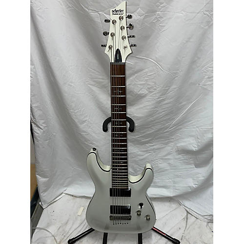 Schecter Guitar Research Used Schecter Guitar Research Demon 7 String Vintage White Solid Body Electric Guitar Vintage White