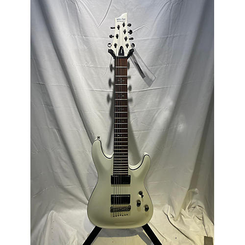 Schecter Guitar Research Used Schecter Guitar Research Demon 7 String Vintage White Solid Body Electric Guitar Vintage White