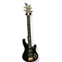 Used Schecter Guitar Research Johnny Christ Signature Black and Gold Electric Bass Guitar Black and Gold