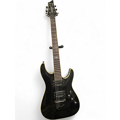 Used Schecter Guitar Research stealth Black and Gold Solid Body Electric Guitar
