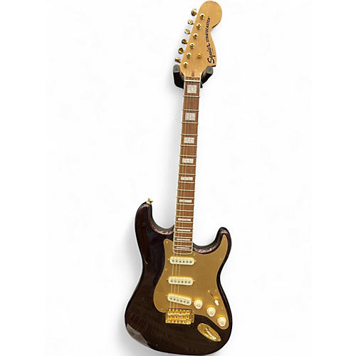 Used Squier  40th Anniversary Stratocaster®, Gold Edition ruby red metallic Solid Body Electric Guitar ruby red metallic