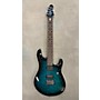 Used Sterling by Music Man Used Sterling By Music Man JP100D Trans Green Solid Body Electric Guitar Trans Green