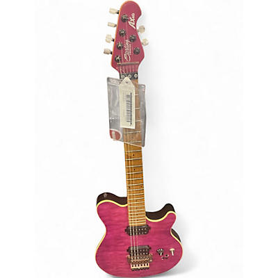 Used Sterling by Music Man AX40 trans pink Solid Body Electric Guitar