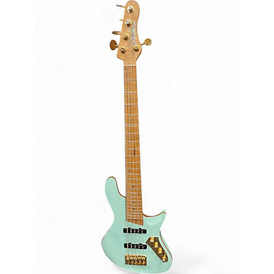 Used Warrior BELA Turquoise Electric Bass Guitar