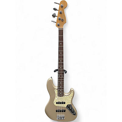 Vintage 1997 Fender Jazz Bass Deluxe Shoreline Gold Electric Bass Guitar