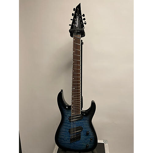 Jackson X Series Soloist Arch Top SLATX7Q MS 7-String Multi-Scale Solid Body Electric Guitar Transparent Blue Burst